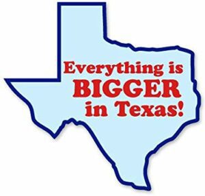 A blue texas shaped sticker with the words " everything is bigger in texas !"